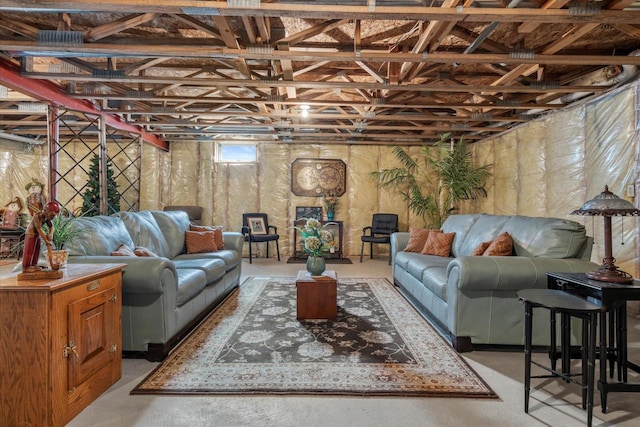 living area featuring concrete floors