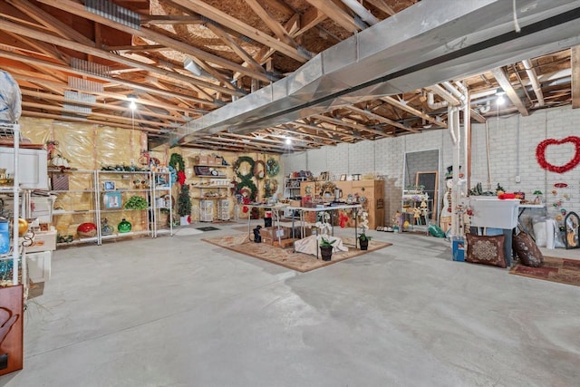 unfinished below grade area with a workshop area