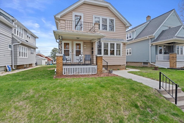 dutch colonial with a porch, a front lawn, and a balcony