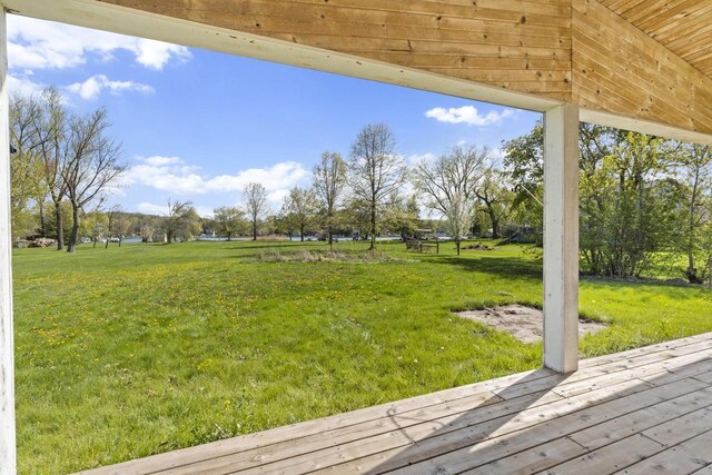 3559 N Shore Dr, Hubertus, WI 53033 - view of green lawn with a deck