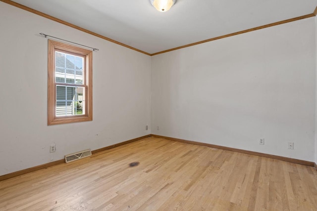 3559 N Shore Dr, Hubertus, WI 53033 - empty room with crown molding, light wood-style flooring, and baseboards