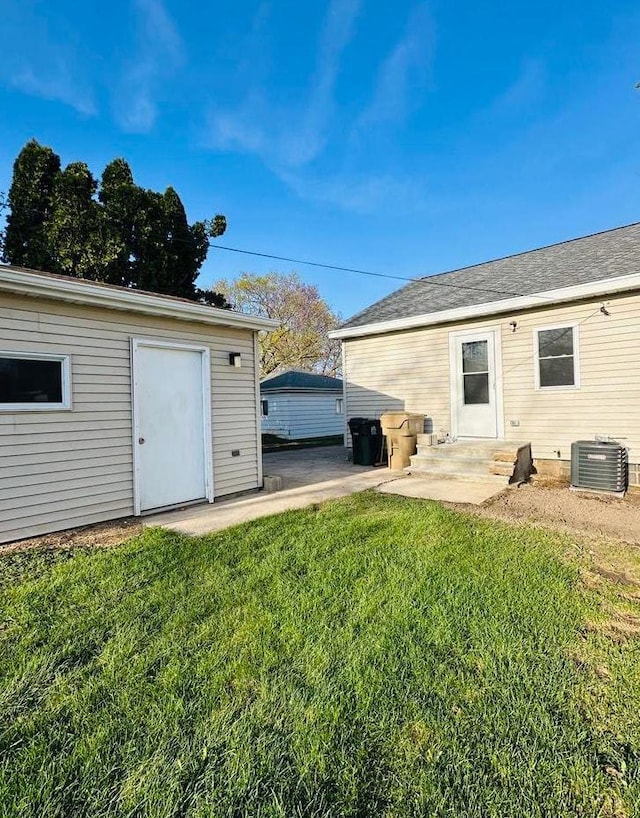 14 Wirth Ct, Madison, WI 53704 - view of green lawn featuring cooling unit, a patio, and an outdoor structure