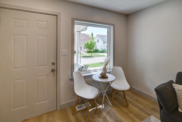 14 Wirth Ct, Madison, WI 53704 - dining area featuring light wood-style flooring and baseboards