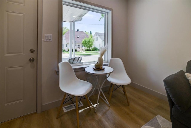 14 Wirth Ct, Madison, WI 53704 - dining room featuring baseboards and wood finished floors