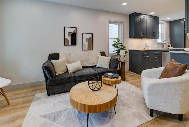 14 Wirth Ct, Madison, WI 53704 - living room featuring light wood-style flooring, recessed lighting, and baseboards
