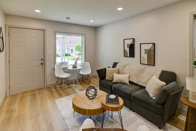 14 Wirth Ct, Madison, WI 53704 - living area with light wood finished floors, recessed lighting, and baseboards