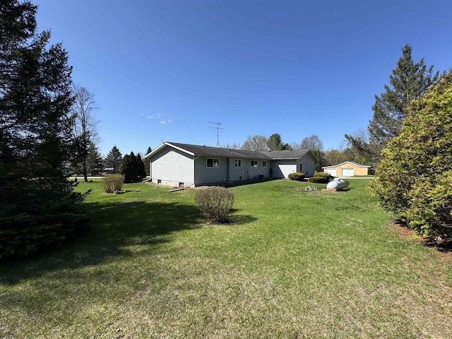 34103 Putnam St, Muscoda, WI 53573 - view of yard featuring an attached garage