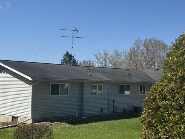 34103 Putnam St, Muscoda, WI 53573 - rear view of house with a lawn and cooling unit
