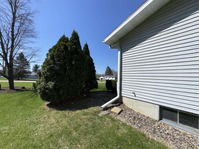 34103 Putnam St, Muscoda, WI 53573 - view of side of home with a lawn