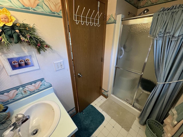 34103 Putnam St, Muscoda, WI 53573 - full bath with vanity, tile patterned floors, and a shower stall