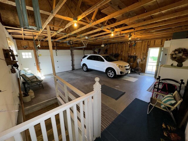 34103 Putnam St, Muscoda, WI 53573 - garage featuring a garage door opener