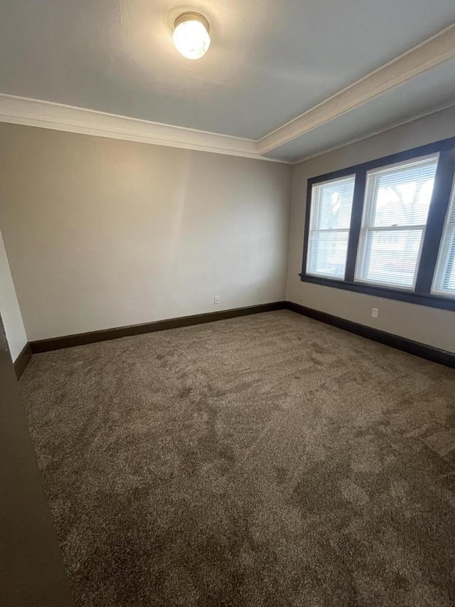 3367 N 36th St, Milwaukee, WI 53216 - carpeted spare room with crown molding and baseboards