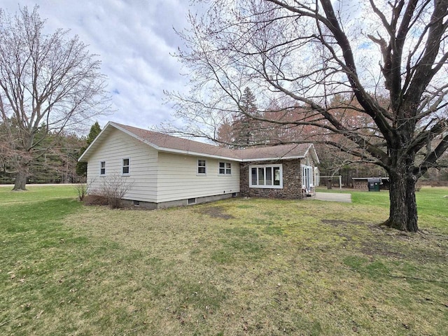 3653 County Road Q, Wisconsin Rapids, WI 54495 - exterior space featuring a yard