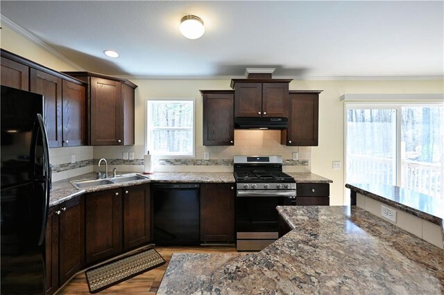 13585 Oswald Rd, Drummond, WI 54832 - kitchen featuring ventilation hood, crown molding, a sink, and black appliances