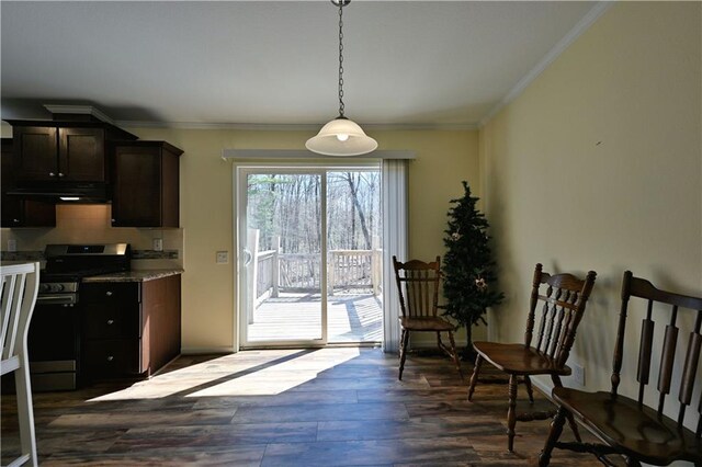 13585 Oswald Rd, Drummond, WI 54832 - interior space featuring stainless steel range with gas cooktop, dark wood-style flooring, crown molding, and ventilation hood