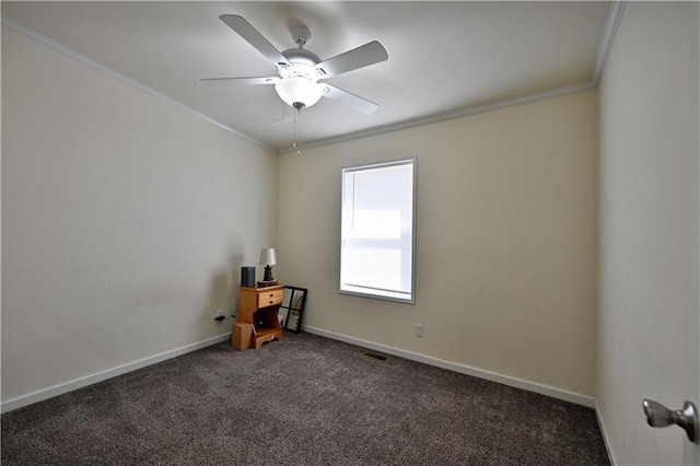 13585 Oswald Rd, Drummond, WI 54832 - carpeted empty room with crown molding, baseboards, ceiling fan, and visible vents