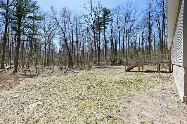 13585 Oswald Rd, Drummond, WI 54832 - view of yard featuring stairs and a deck