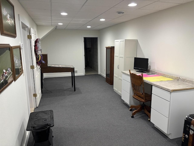 office featuring recessed lighting, baseboards, built in study area, and dark colored carpet