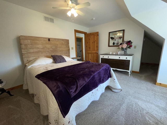 bedroom featuring carpet floors, baseboards, visible vents, and ceiling fan
