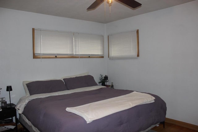 436 Roosevelt St, Fond Du Lac, WI 54935 - bedroom featuring ceiling fan, wood finished floors, and baseboards