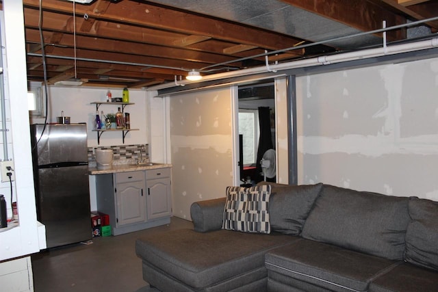 436 Roosevelt St, Fond Du Lac, WI 54935 - finished basement featuring freestanding refrigerator and a sink