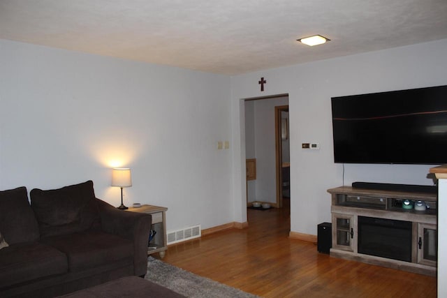 436 Roosevelt St, Fond Du Lac, WI 54935 - living area featuring wood finished floors and baseboards
