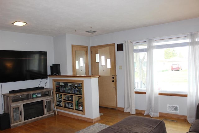 436 Roosevelt St, Fond Du Lac, WI 54935 - living area featuring wood finished floors and baseboards