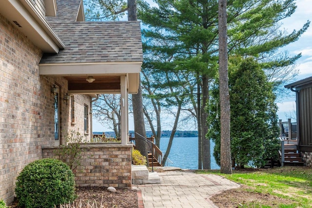 W347N5904 Lake Dr, Oconomowoc, WI 53066 - exterior space with a water view and stairway