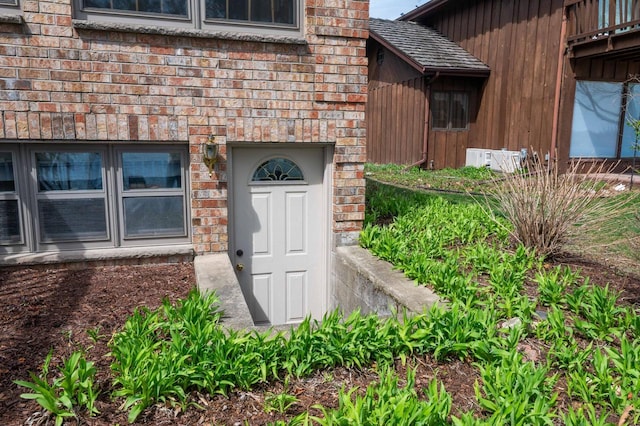 W347N5904 Lake Dr, Oconomowoc, WI 53066 - property entrance with brick siding