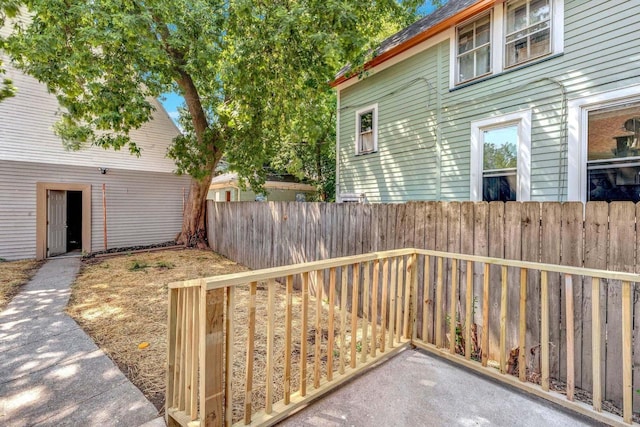 view of side of property featuring a fenced backyard
