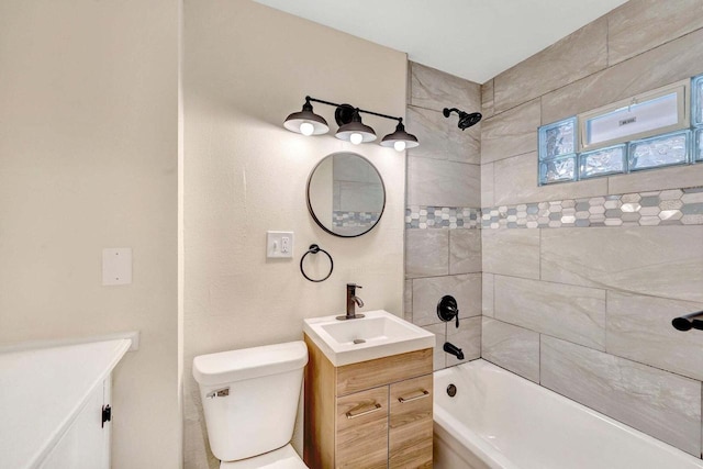 full bathroom with vanity, bathtub / shower combination, and toilet