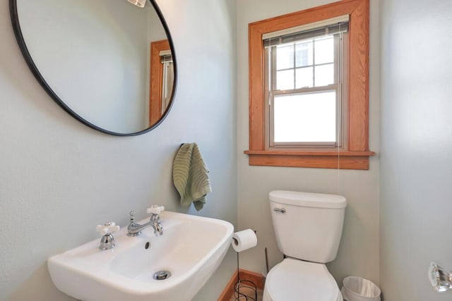 1517 Torrison Dr, Manitowoc, WI 54220 - half bath featuring a sink and toilet