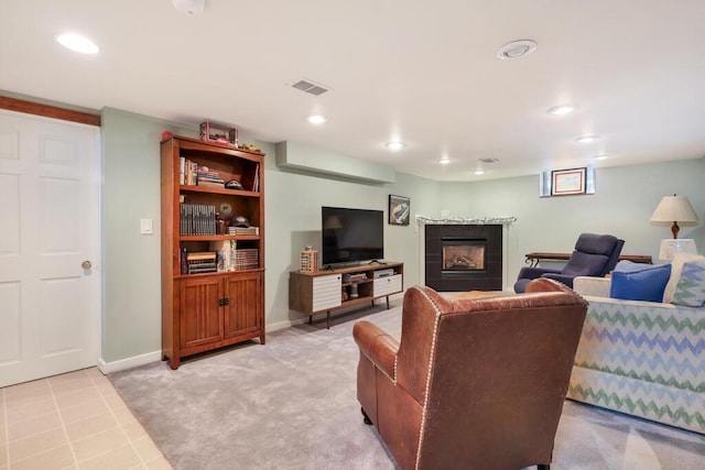 1517 Torrison Dr, Manitowoc, WI 54220 - living room featuring a tile fireplace, recessed lighting, light colored carpet, and baseboards
