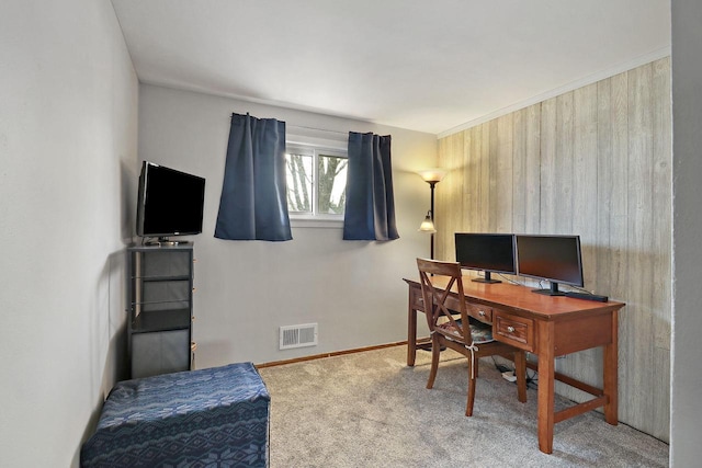 office space featuring visible vents, carpet flooring, and baseboards