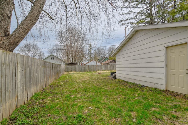 view of yard with a fenced backyard