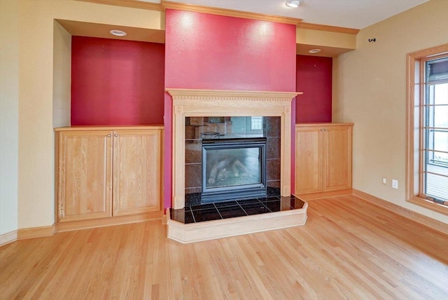 457 Union Rd, Brooklyn, WI 53521 - unfurnished living room with baseboards, wood finished floors, and a fireplace