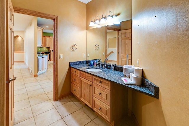 457 Union Rd, Brooklyn, WI 53521 - bathroom featuring tile patterned floors, baseboards, and vanity