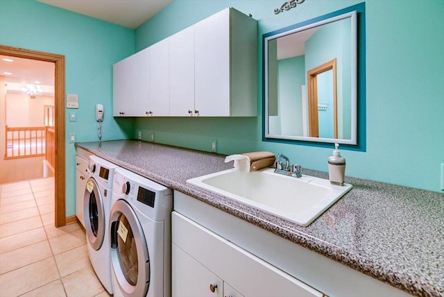 457 Union Rd, Brooklyn, WI 53521 - laundry room featuring a sink, light tile patterned floors, cabinet space, and independent washer and dryer