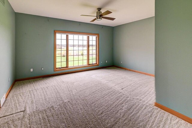 457 Union Rd, Brooklyn, WI 53521 - carpeted spare room featuring baseboards, a ceiling fan, and visible vents
