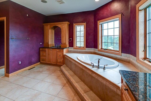 457 Union Rd, Brooklyn, WI 53521 - full bath with tile patterned flooring, a garden tub, and vanity