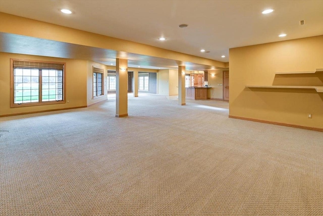 457 Union Rd, Brooklyn, WI 53521 - below grade area featuring light colored carpet, recessed lighting, and baseboards