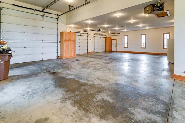 457 Union Rd, Brooklyn, WI 53521 - garage featuring a garage door opener