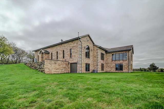 457 Union Rd, Brooklyn, WI 53521 - view of property exterior with central AC unit and a yard