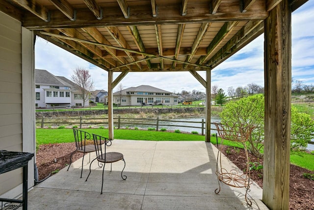 3500 Sequoia Cir, Waukesha, WI 53188 - view of patio / terrace with a residential view, fence, and a water view