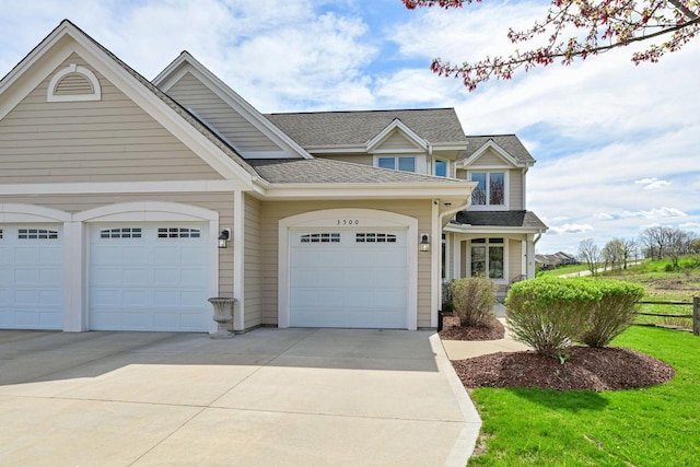 3500 Sequoia Cir, Waukesha, WI 53188 - view of front facade featuring fence, driveway, roof with shingles, and a garage