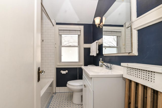 full bathroom with vanity, tile patterned flooring, washtub / shower combination, and toilet