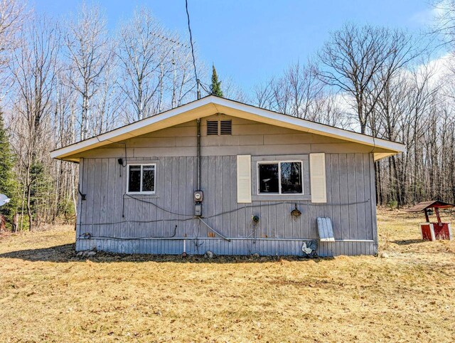 W7150 Maple Ridge Ln, Phillips, WI 54555 - view of side of home