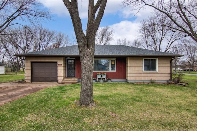 view of front of property with a garage, a shingled roof, a front yard, and concrete driveway