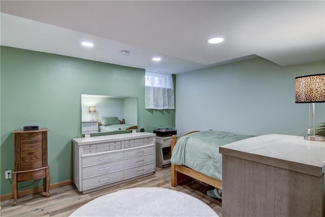 bedroom featuring recessed lighting, baseboards, and light wood-style flooring