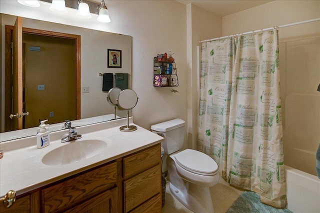 full bath with vanity, shower / bath combo with shower curtain, and toilet